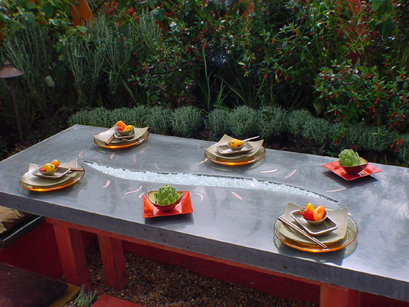 fountain surrounded by greenery